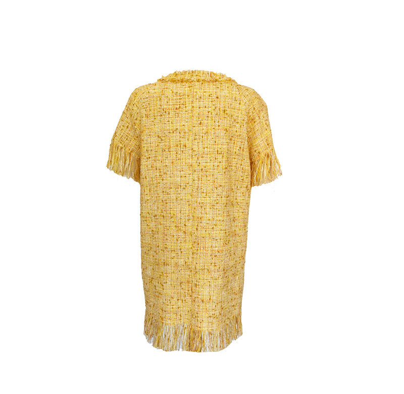 A formet kjole i gul tweed